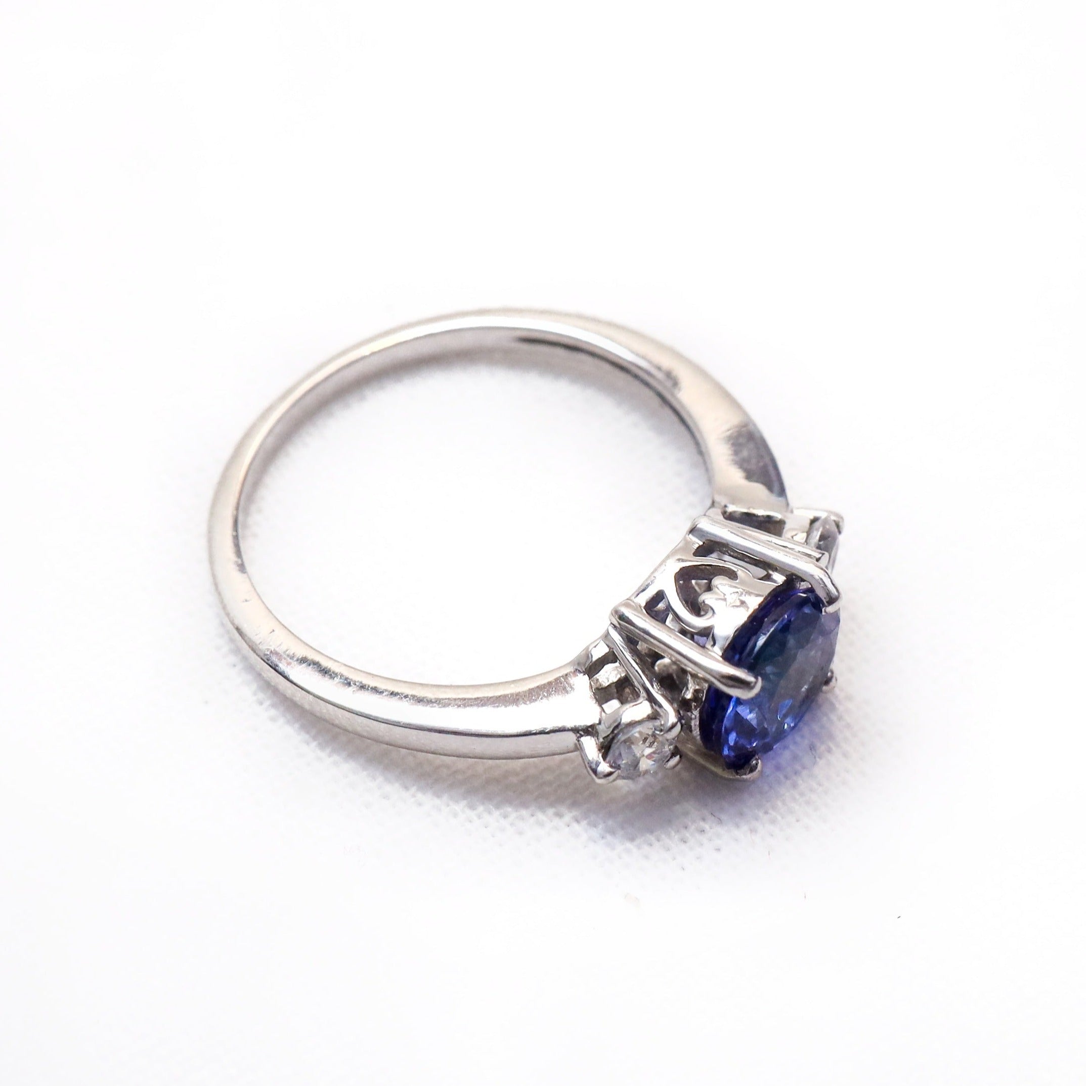 Classic Round Tanzanite and Moissanite Three stone ring