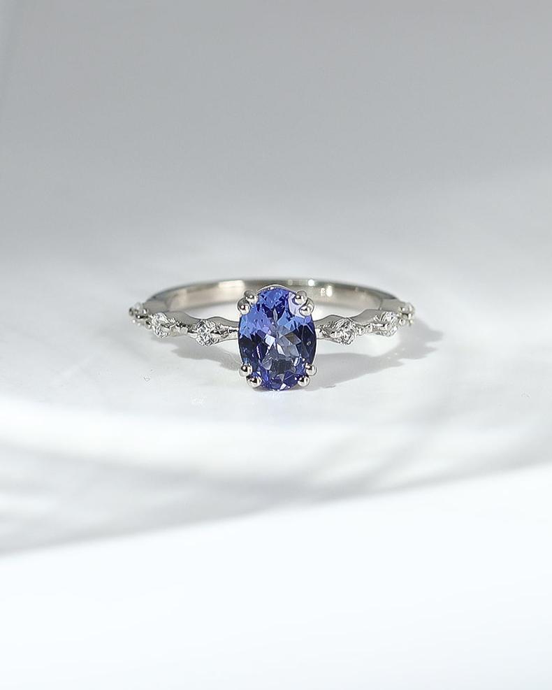 Solitaire Oval Tanzanite Solitaire Ring with Diamond Accents