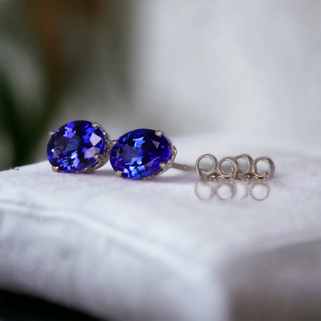 Prong-Set Oval Solitaire Tanzanite Stud Earrings