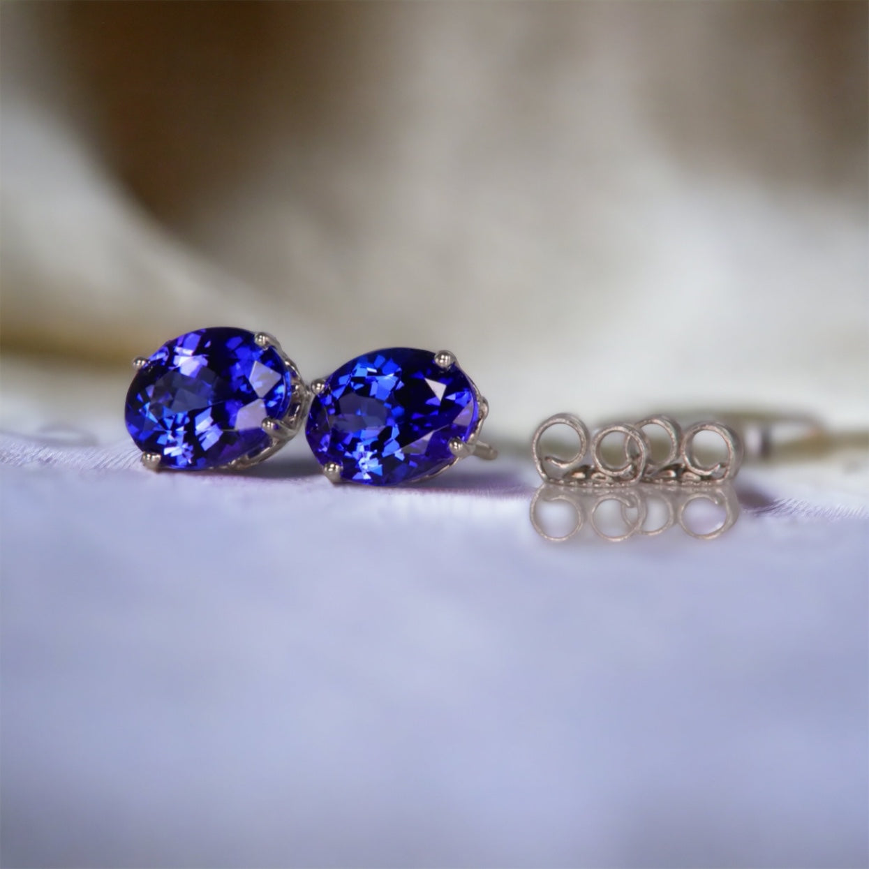 Prong-Set Oval Solitaire Tanzanite Stud Earrings