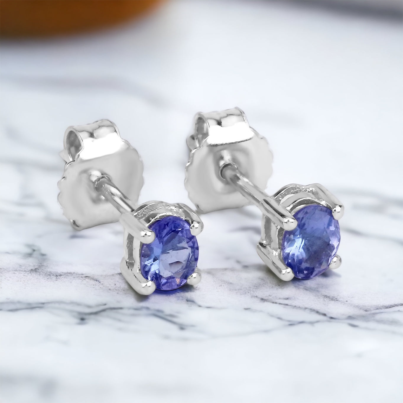 Minimal Basket-Set Oval Tanzanite Studs