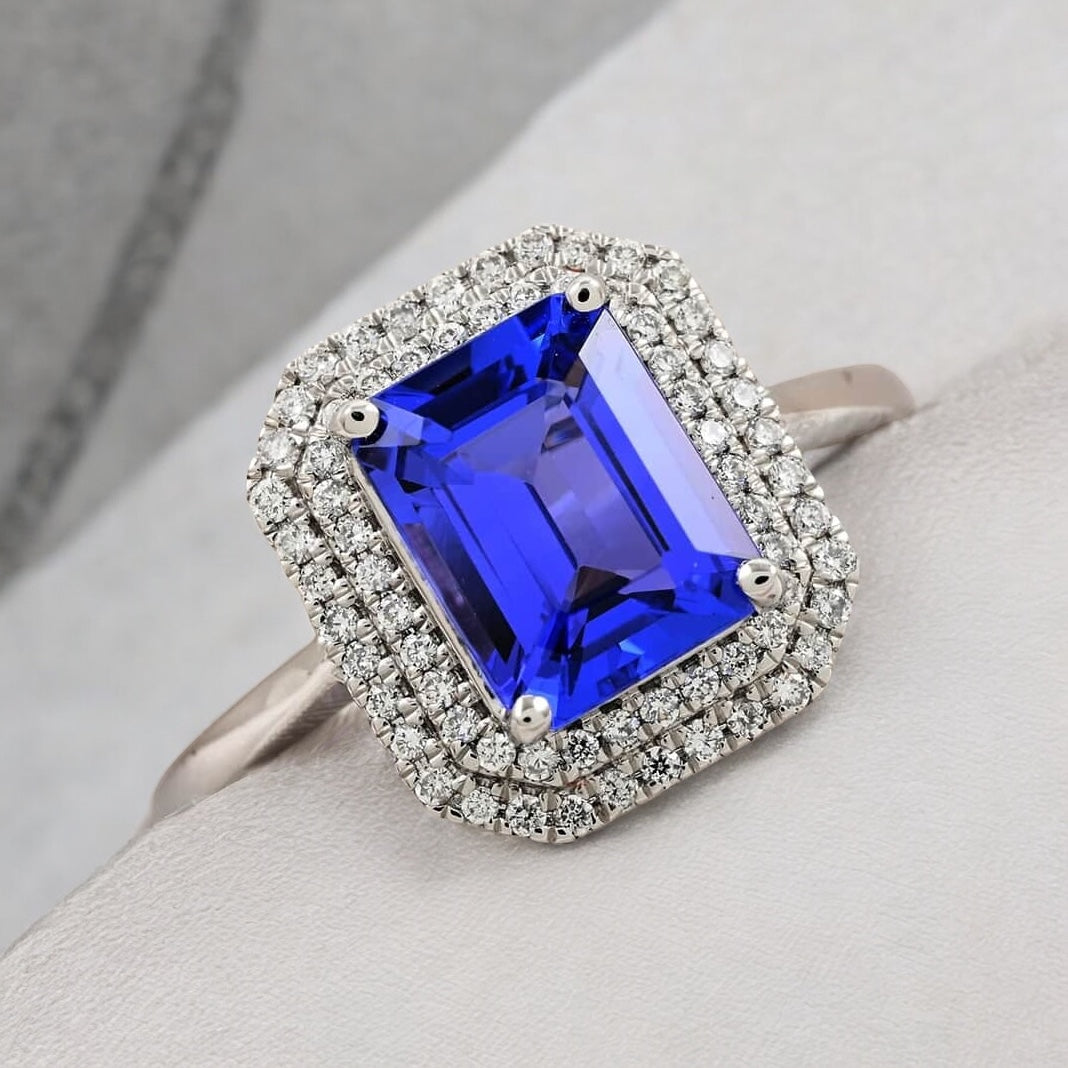 Emerald cut Tanzanite Engagement Ring with Moissanite accent halo