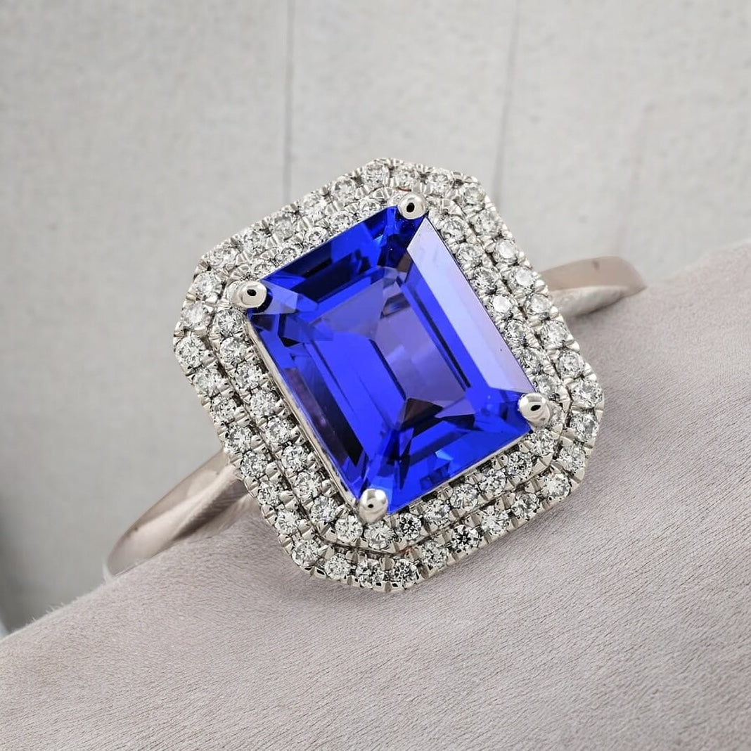 Emerald cut Tanzanite Engagement Ring with Moissanite accent halo