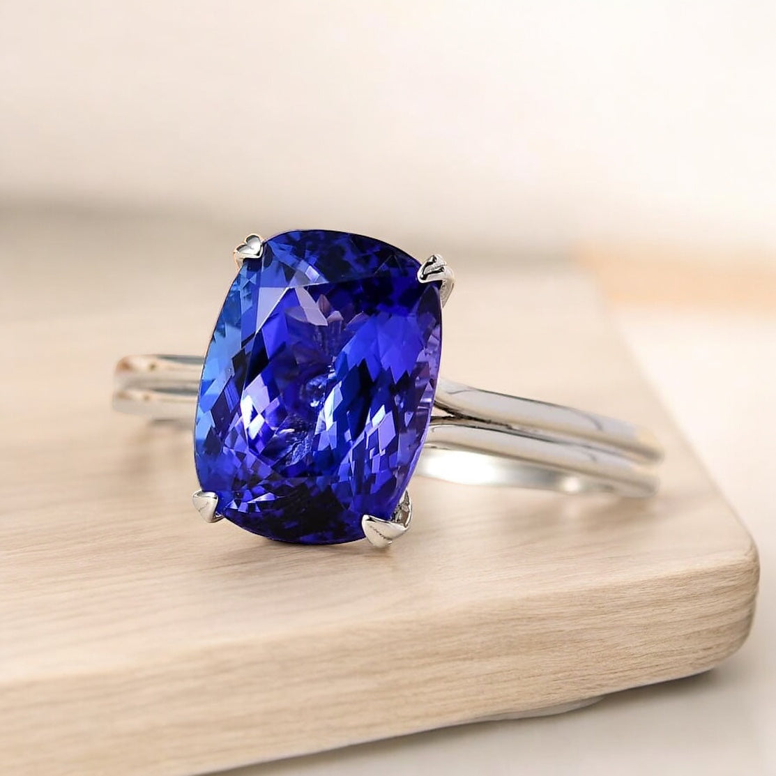 Long Cushion Tanzanite Solitaire Ring with a Diamond Accent