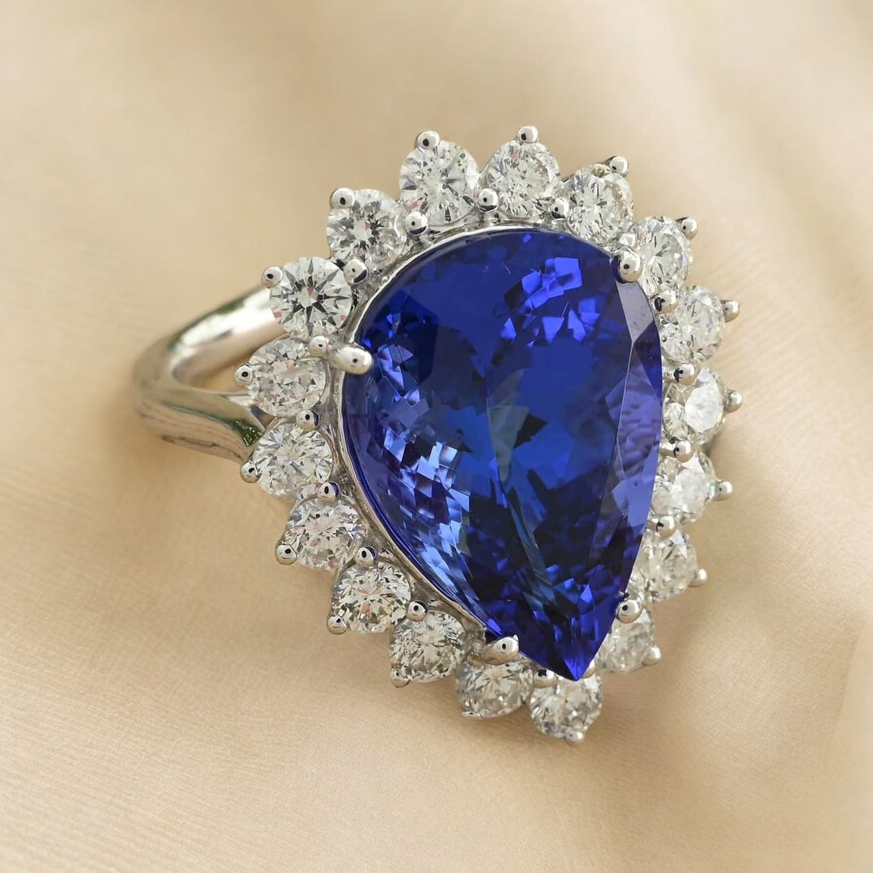 Chunky AAAA Pear Tanzanite Ring with Diamond Halo