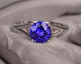 V Bar-Set Solitaire Round Tanzanite Bypass Ring