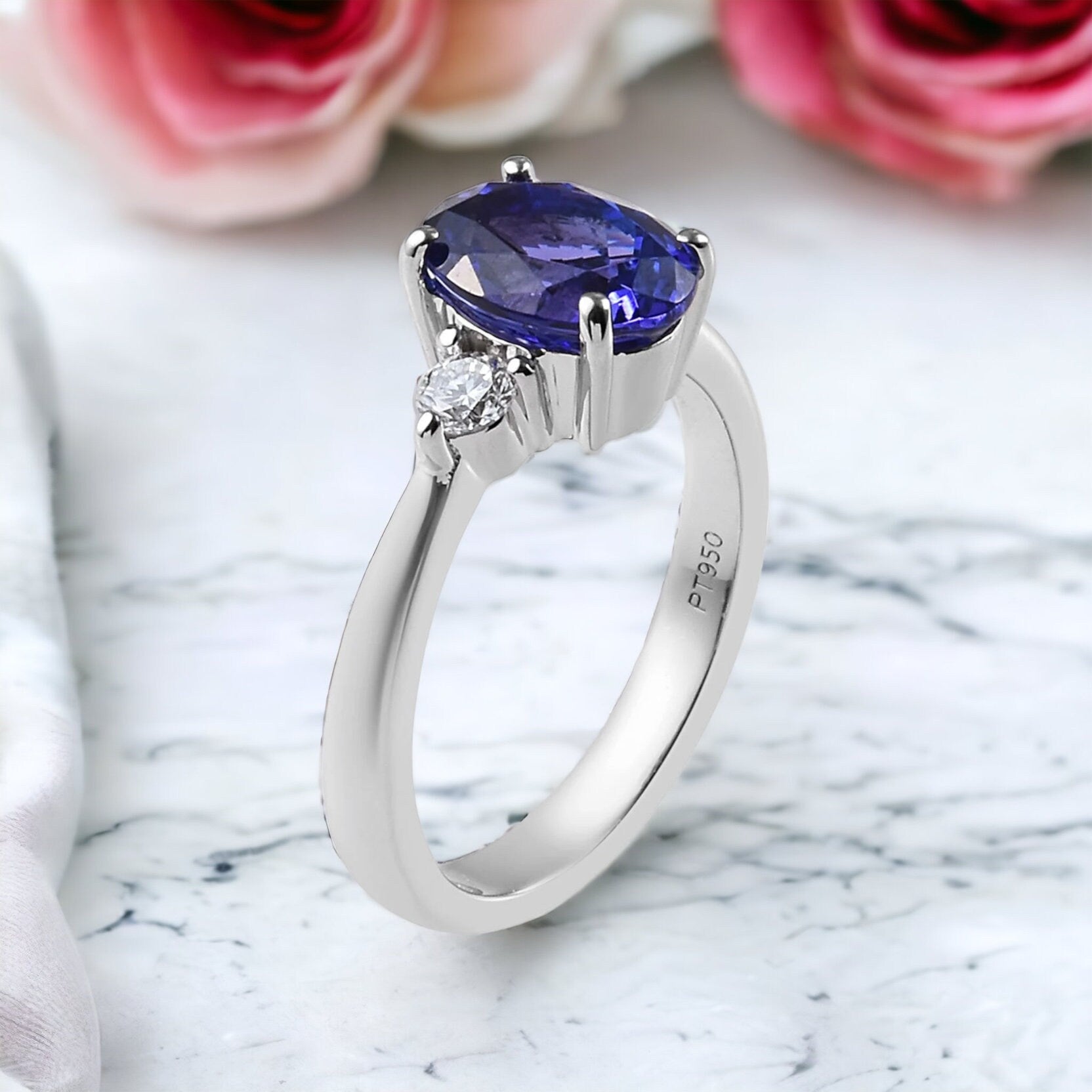 Classic Tanzanite and Diamond Three Stone Engagement Ring