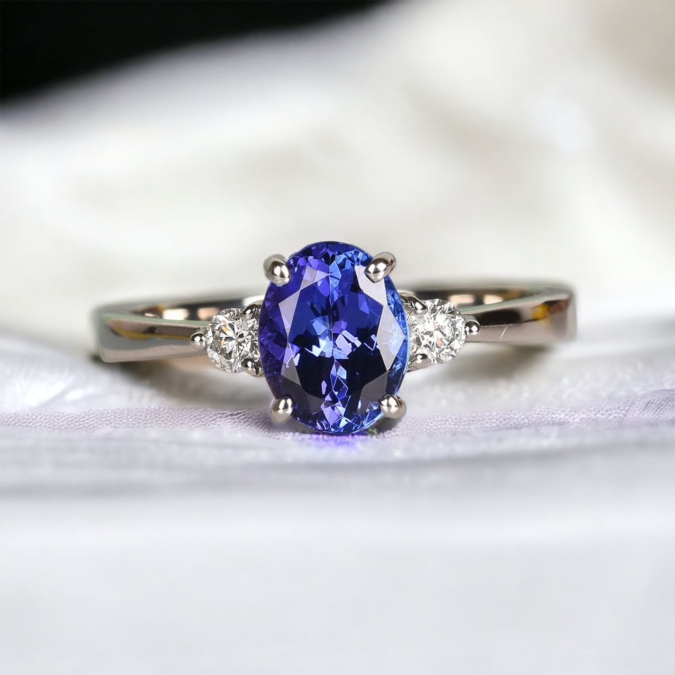 Classic Tanzanite and Diamond Three Stone Engagement Ring