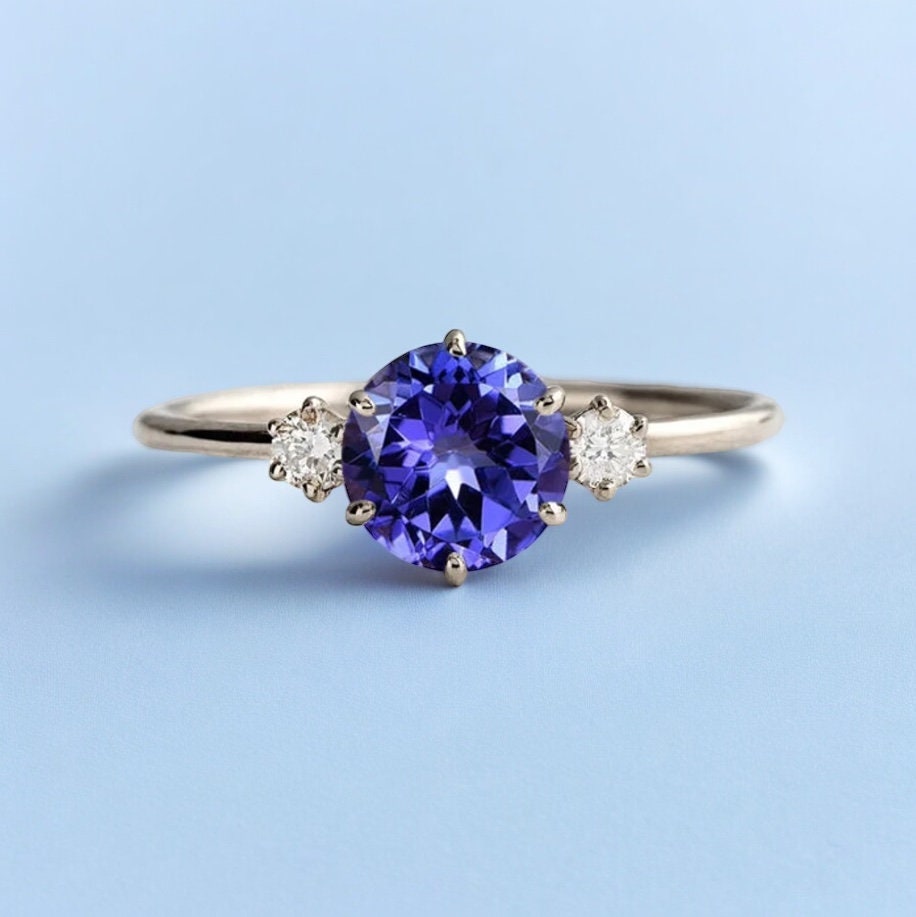 Classic Tanzanite and Diamond Three Stone Engagement Ring