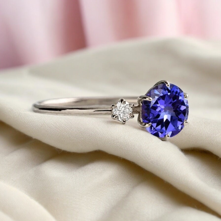 Classic Tanzanite and Diamond Three Stone Engagement Ring