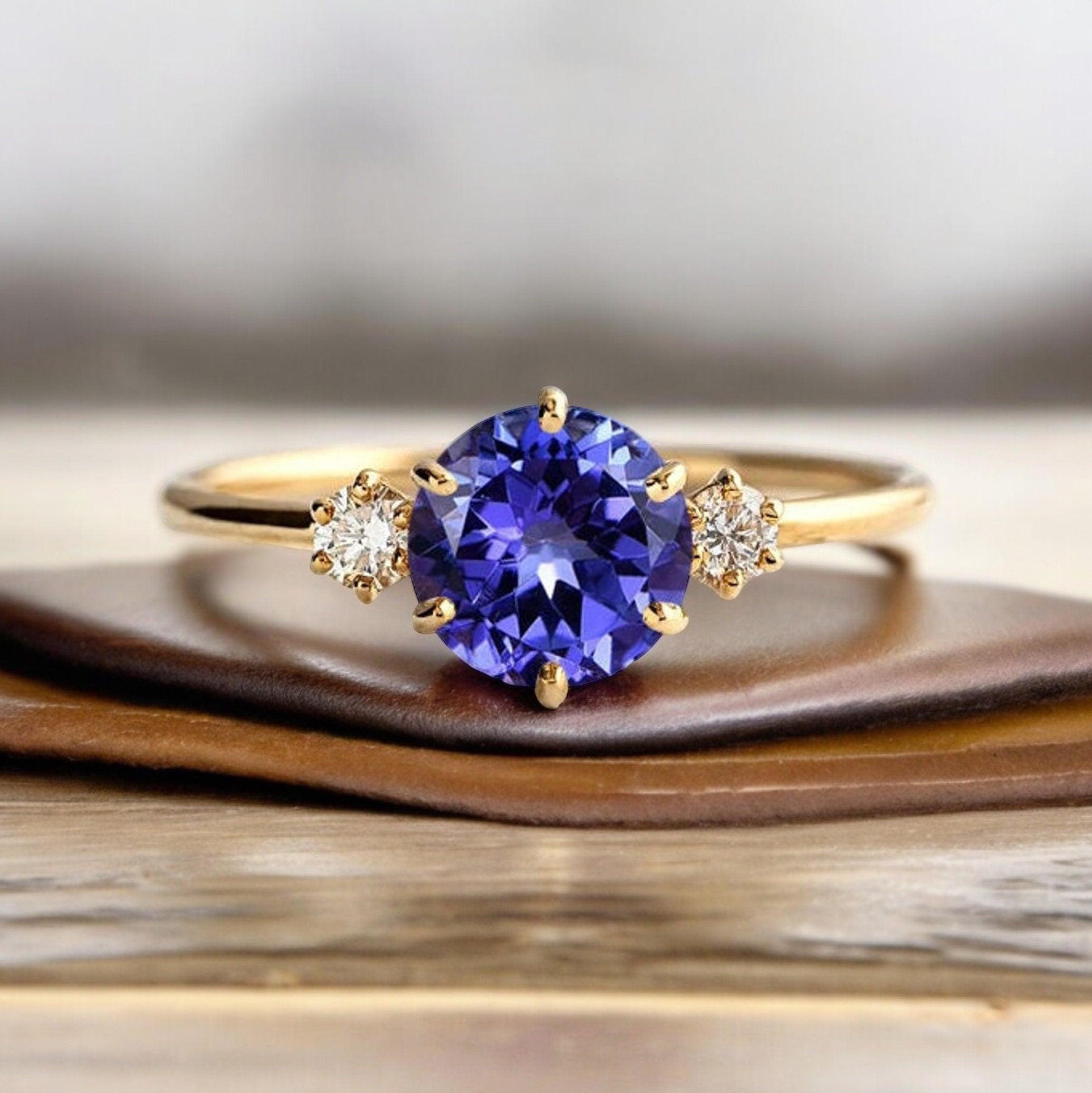 Classic Tanzanite and Diamond Three Stone Engagement Ring