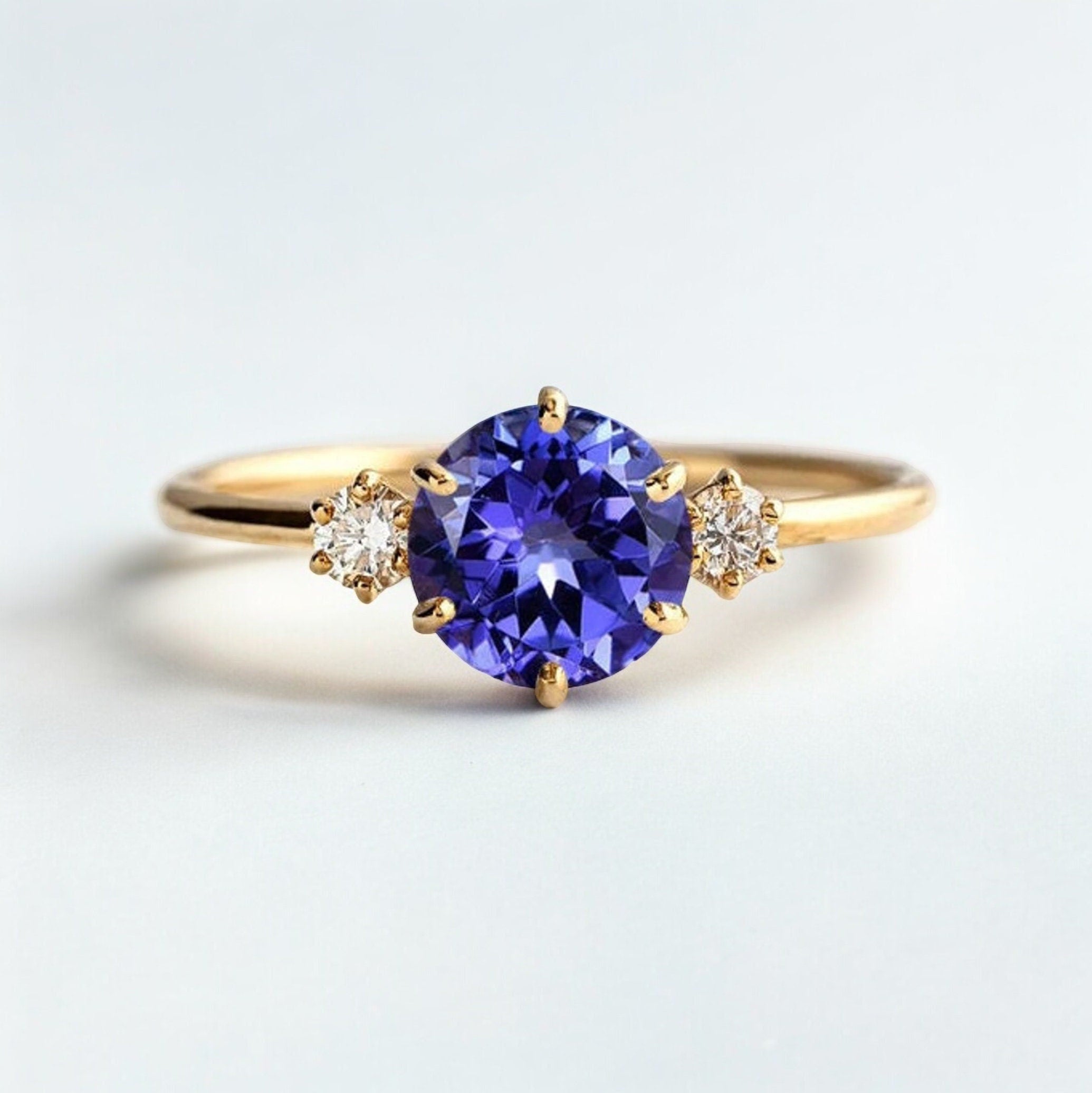 Classic Tanzanite and Diamond Three Stone Engagement Ring