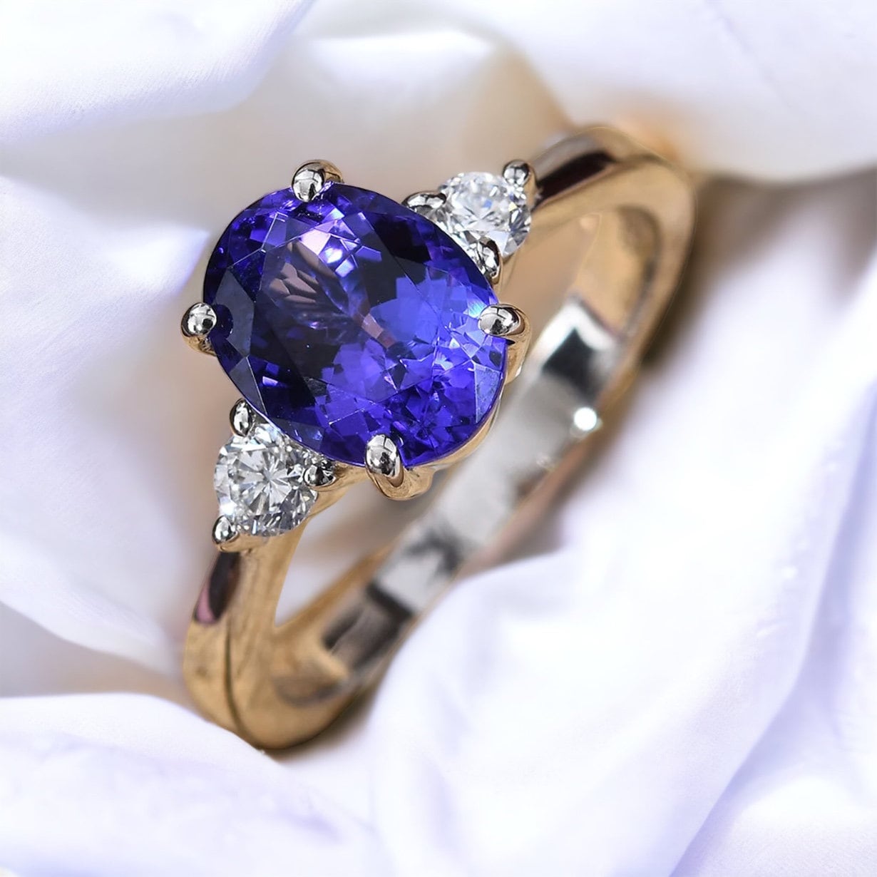 Classic Tanzanite and Diamond Three Stone Engagement Ring