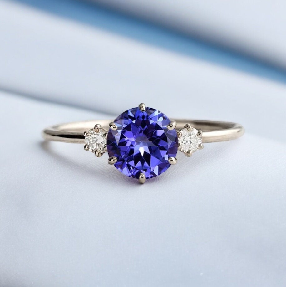 Classic Tanzanite and Diamond Three Stone Engagement Ring