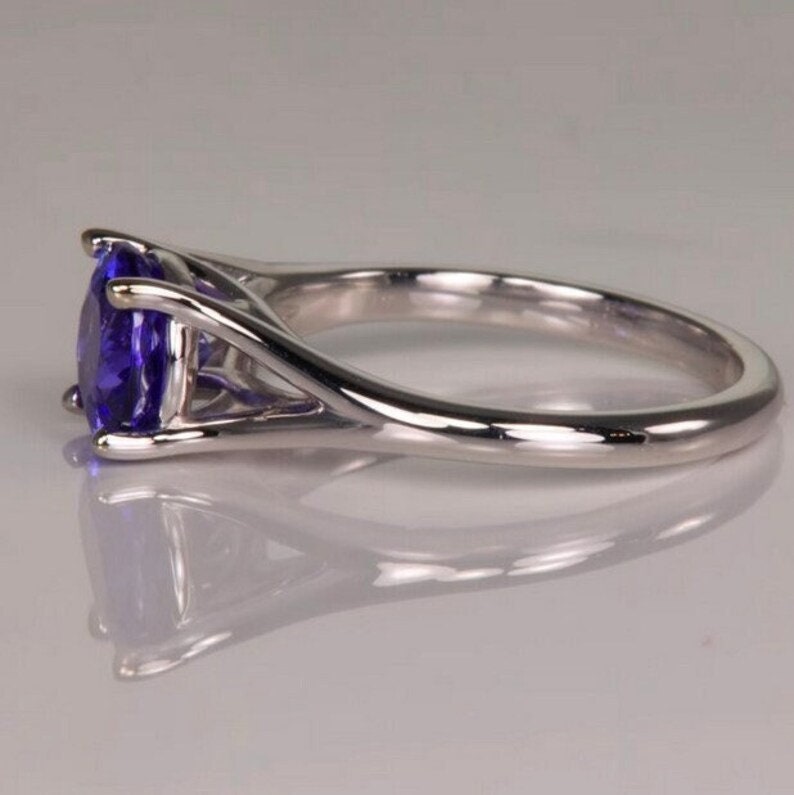 V Bar-Set Solitaire Round Tanzanite Bypass Ring